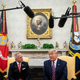 Representative Jeff Van Drew of New Jersey, who has announced he is switching from the Democratic to Republican Party, looks on as U.S. President Donald Trump in the Oval Office of the White House on Dec. 19, 2019, in Washington, D.C. Van Drew voted against the two articles of impeachment yesterday in the House of Representatives.